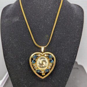 Ladies Geneva heart shaped pendant watch